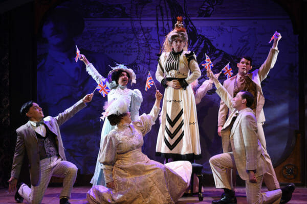 PMT_AGentlemansGuidetoLove&Murder_7 - (L to R) Michael Reyes, Sharriese Hamilton, Megan Elk, Matt Crowle, on chair, Ryan Dooley and Billy Dwyer in A GENTLEMANS GUIDE TO LOVE & MURDER from Porchlight Music Theatre Porchlight Music Theatre A GENTLEMAN’S GUIDE TO LOVE AND MURDER